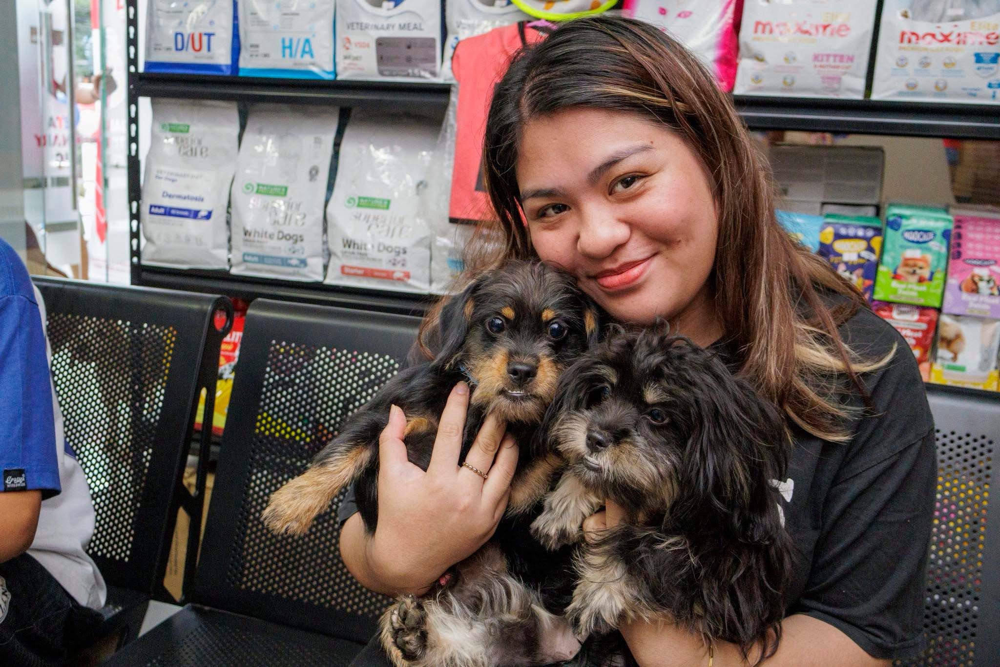 Furparent and happy dog at Gabieta Vet